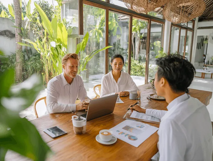 Foreign PT PMA owner in Bali meeting a notary and tax consultant to process inherited land certificate name change through BPN and DJP Online