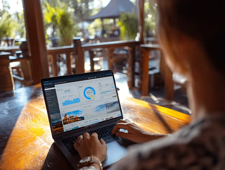 Foreign entrepreneur reviewing PT PMA payroll and tax documents in Bali office to ensure DJP compliance and accurate PPh 21 reporting.