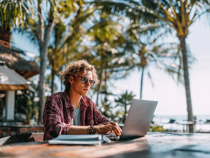 Foreign director in Bali resolving Coretax DJP login issue through pajak.go.id, updating PT PMA tax portal access and credentials.