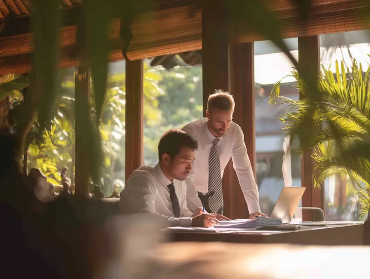 Finance team of a PT PMA in Bali correcting PPh 26 overpayment through Coretax 2026 system with verified tax documents and VAT compliance