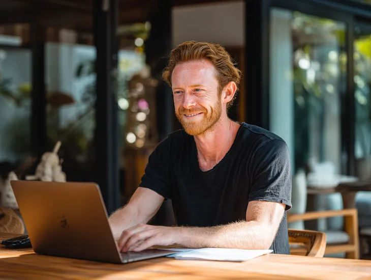 French PT PMA owner in Bali reviewing e-Faktur and Coretax 2026 VAT reports with tax consultant to ensure accurate legal compliance