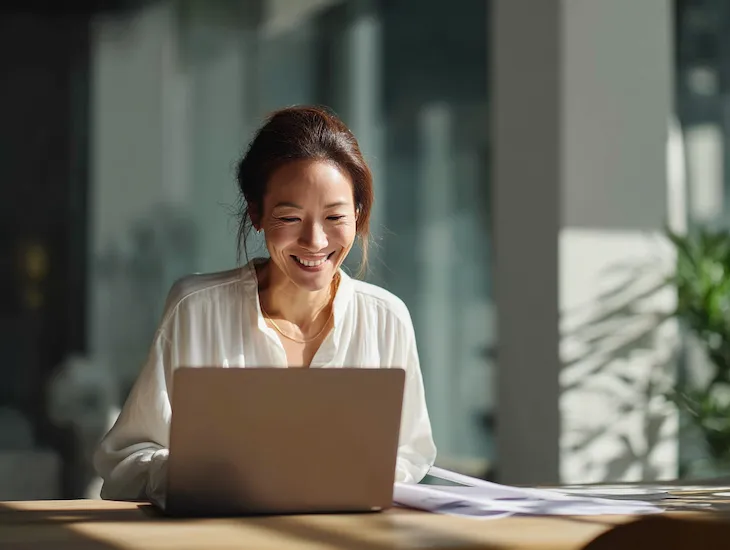 Malaysian entrepreneur managing PT PMA payroll in Bali with Coretax software after Indonesia’s 2026 salary tax reform