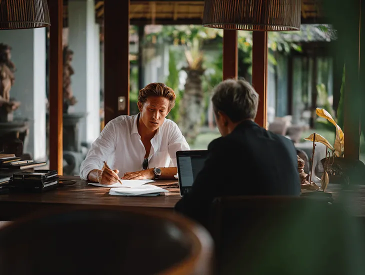 PT PMA investors in Bali analyzing crypto tax documents and VAT compliance updates under Indonesia’s 2025 digital tax reform