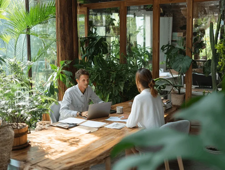 Foreign PT PMA owner in Bali reviewing online tax compliance documents and Coretax DJP reports for annual filing