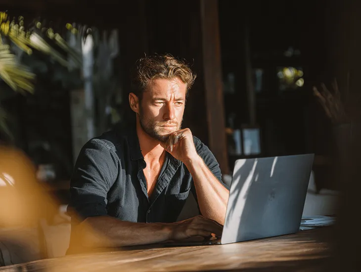 Foreign PT PMA owner in Bali checking marketplace tax reports and Coretax DJP Online compliance under PMK 37/2025