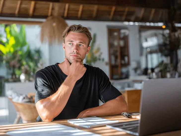 PT PMA owner in Bali reviewing digital tax exemption documents under Indonesia’s IDR 500 million MSME threshold