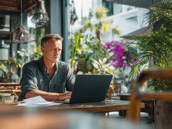 Foreign PT PMA owner in Bali reviewing Indonesia’s new PER-11/PJ/2025 combined tax invoice format for VAT and income tax compliance