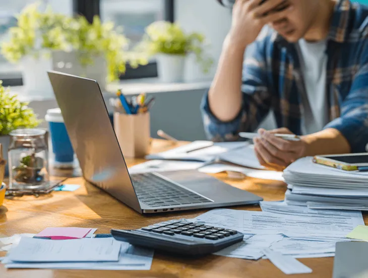 PT PMA importer in Bali reviewing tariff list and customs documents to ensure tax compliance after Trump 2025 trade policy