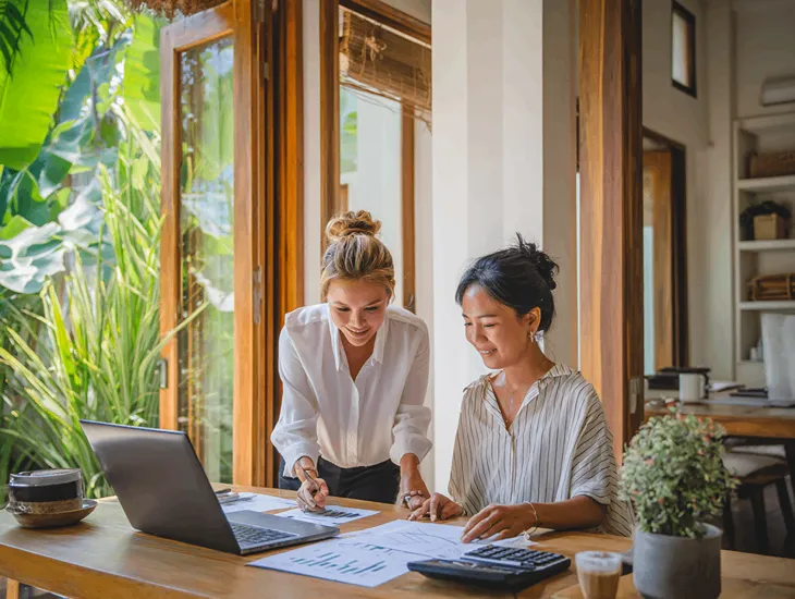 PT PMA representative in Bali submitting PKP revocation documents and VAT reports to the Directorate General of Taxes under PER-7/PJ/2025 compliance