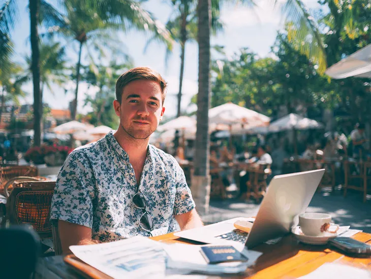 Foreign PT PMA owner in Bali reviewing rejected tax refund claim through Indonesia’s Coretax DJP Online and verifying fiscal documents for compliance