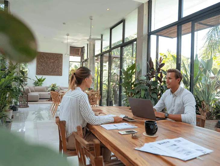 Foreign PT PMA owner in Bali resolving Coretax DJP Online reporting errors by verifying NPWP, EFIN, and tax deposit data for Indonesia compliance