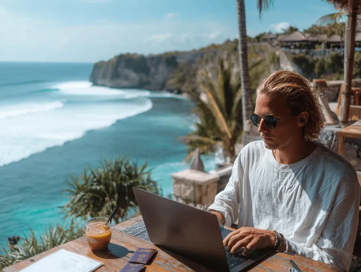 Foreign PT PMA owner in Bali reviewing annual SPT and Article 25 Income Tax exemption rules through Indonesia’s Coretax DJP Online system