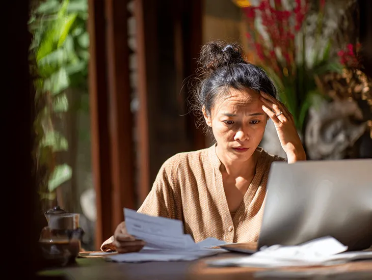 PT PMA accountant in Bali resolving Coretax DJP Online errors 96, 99, and 225 on laptop to restore tax filing access and compliance